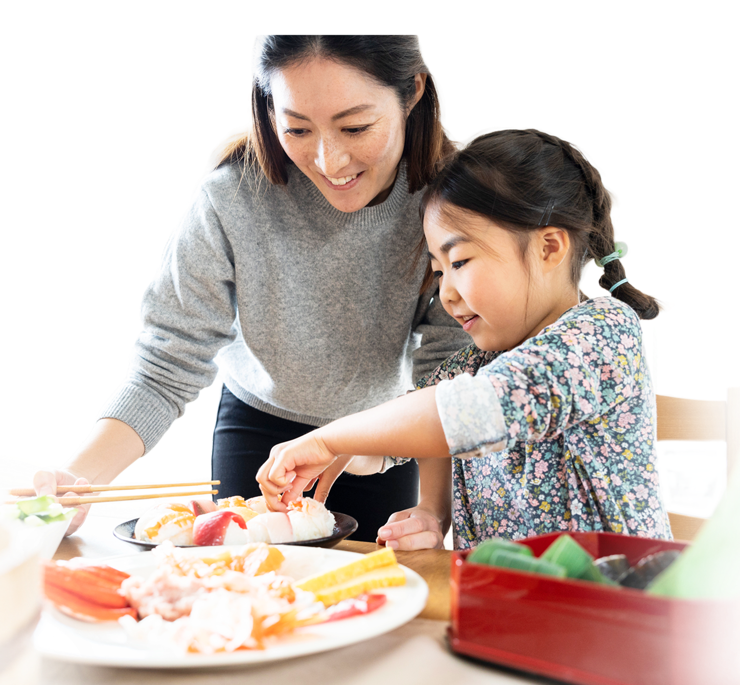 長鎖脂肪酸代謝異常症（LC-FAOD） 患者さんの親子が一緒に食事を準備している様子